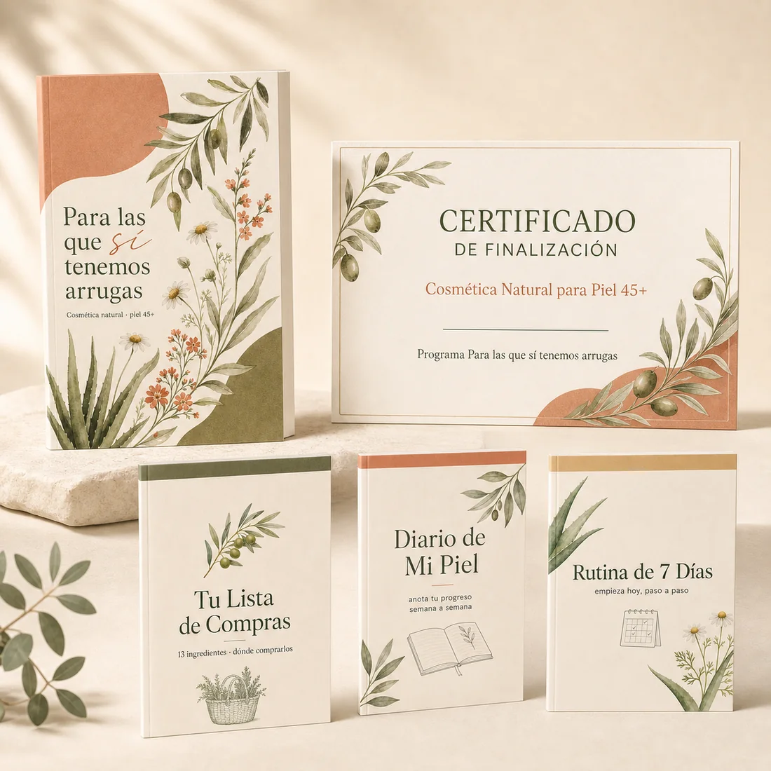 El libro principal junto a las 3 guías de regalo, con sérum y crema natural